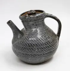 Len Castle, Pinched coffee pot, stoneware with matt grey glaze over tenmoku, combed decoration, c. 1960s