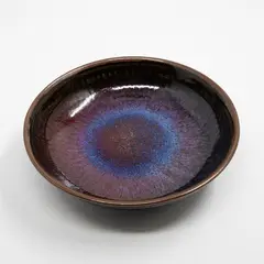 Len Castle, Stoneware bowl, with red and blue jun glaze over tenmoku