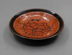Len Castle, Small dish, stoneware with crawled terracotta red glaze with crackled effect over tenmoku