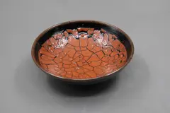 Len Castle, Small bowl, stoneware with crawled terracotta red glaze with crackled effect over tenmoku