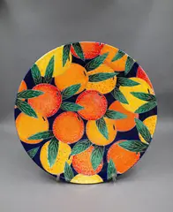 Zeke Wolf, Oranges and Lemons bowl, glazed ceramic, decorated with colourful lemon and orange pattern (with metal stand)