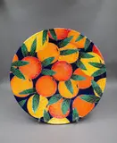 Zeke Wolf, Oranges and Lemons bowl, glazed ceramic, decorated with colourful lemon and orange pattern (with metal stand)