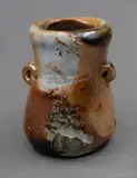 Chester Nealie, Small asymmetrical jar, wood fired stoneware with shell marks and small lug handle