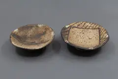 Richard Parker, Two signal dishes, unglazed earthenware with painted designs