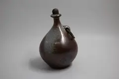 Lawrence Ewing, Bottle vase, stoneware with shino glaze, original cork stopper and rope handle