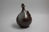 Lawrence Ewing, Bottle vase, stoneware with shino glaze, original cork stopper and rope handle