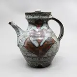 Warren Tippett, Teapot, stoneware with wax resist tenmoku pattern on a mottled grey ground