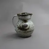 Len Castle, Small jug, stoneware with matt white glaze over saturated iron glaze, with gestural design