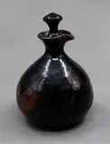 Warren Tippett, Oil bottle