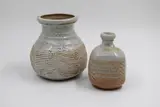 Warren Tippett, Shino glaze jar and bottle, stoneware, decorated with combed design
