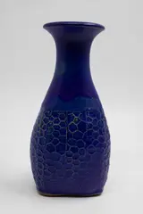 Graeme Storm, Bottle vase, stoneware with dark blue glaze, honeycomb pattern decoration to the lower body