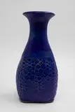 Graeme Storm, Bottle vase, stoneware with dark blue glaze, honeycomb pattern decoration to the lower body