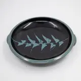 Peter Stichbury, Serving dish, stoneware with a wax resist stylised design in blue and black glazes, c. 1994