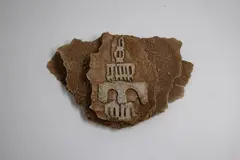 Doris Dutch, Cityscape plaque, ochre washed three-layered stoneware with applied relief decoration (AF)