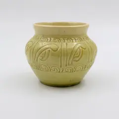 Briar Gardner, Small jar, in yellow glaze with incised koru decoration