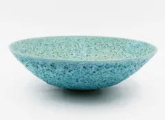 John Parker, Large lava bowl, azure blue glazed ceramic with textured volcanic crater motifs