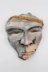 Helen Pollock, Wall mask, raku fired earthenware with rope and reed adornment