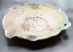 P. Burmeister, Holocost I, large stoneware wall charger, partially glazed and pigmented, 1988 (suspension holes to foot)