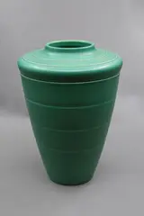 Large shoulder vase by Keith Murray for Wedgwood, of tapering conical shape with lathe turned bands, in matt green glaze (shape no. 3805) (wear), sold Jun 2026