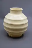 Keith Murray for Wedgwood, 'Chinese Lantern' vase, of spherical ribbed form with matt straw glaze (shape no. 3765)