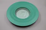 Keith Murray for Wedgwood, Large planter base, raised on a flared foot with a wide banded rim in green matt glaze