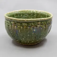 Barry Brickell, Lobed bowl, grogged clay stoneware with bright green glaze, with brown highlights and impressed pattern around the neck, ca. 2000's