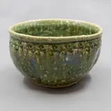Barry Brickell, Lobed bowl, grogged clay stoneware with bright green glaze, with brown highlights and impressed pattern around the neck, ca. 2000's