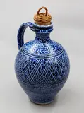 Mirek Smisek, Oil bottle, stoneware with blue salt glaze, with original woven cane and cork stopper, ca. 1990's