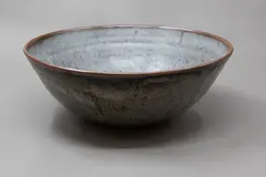 Stoneware bowl by Len Castle, with matt grey glaze over tenmoku, sold Jun 2026