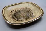 Len Castle, Large and impressive rectangular platter, stoneware with clear dark olive-green celadon glaze and 'tipped in' textured clay inclusion to the centre, mid-1970's