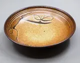 Len Castle, Fine Japanese-style bowl, stoneware with brown and tan glaze, decorated with wax resist quince design, ca. 1970's-1980's