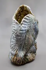 Helen Davidson, Free-form sculptural vase, folded, reworked and heavily textured stoneware body rising to an irregular mouth, with poured jun glaze, ca. 1990's