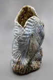 Helen Davidson, Free-form sculptural vase, folded, reworked and heavily textured stoneware body rising to an irregular mouth, with poured jun glaze, ca. 1990's