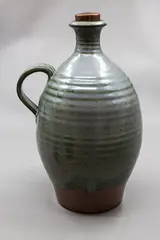 Peter Stichbury, Large flagon, stoneware with grey rutile glaze over tenmoku glaze, with original ceramic and cork stopper