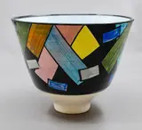 Large footed bowl by Warren Tippett, with polychrome geometrical decoration, sold Jun 2026