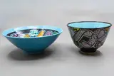 Two footed bowls by Warren Tippett, with matching polychrome abstract decoration on a bright blue ground, one to the interior, the other to the exterior, sold Jun 2026
