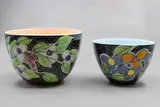 Two deep bowls by Warren Tippett, with similar polychrome flower design (one AF), sold Jun 2026