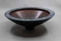 Potter Unknown, Large conical bowl, ceramic with black matt exterior and glitter glaze to the interior