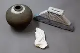 Studio Pottery, Two vases and a small female nude carving by L. Rive