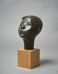 Jim Allen, Portrait of the Artist’s Son, Tony, cast bronze on timber base (1950)