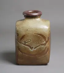 Large Branch vase by Len Castle, press moulded stoneware, the saturated iron underglaze with wax resist blossom decoration and beige rutile overglaze (AF, sold Feb 2026