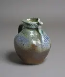 Barry Brickell, Fatso jug, rich blue, green and brown salt glazed stoneware with typical pinched rim with stylized characterful beak form spout