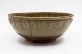 Barry Brickell, Fruit bowl, stoneware with pale olive green ash glaze, decorative pattern to the rim