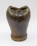 Barry Brickell, Tall pinched vase, grogged clay stoneware with oatmeal and brown glaze, the rim pinched at the centre with applied details and lobed shoulders