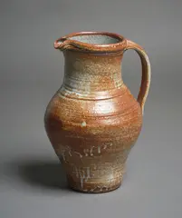 Tall jug by Len Castle, stoneware with shino glaze, sold Feb 2026