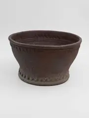 Garden planter by Barry Brickell, unglazed earthenware with fluted walls and impressed decorative patterns to the rims, sold Feb 2026