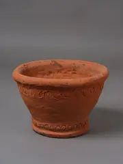 Garden planter by Barry Brickell, unglazed hand coiled terracotta with fluted walls and impressed decorative patterns to the rims, late 2000s, sold Feb 2026