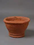 Barry Brickell, Garden planter, unglazed hand coiled terracotta with fluted walls and impressed decorative patterns to the rims, late 2000s