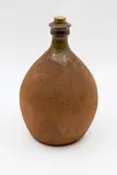 Barry Brickell, Large wine bottle, stoneware with a splash of ash glaze to the rim and neck, the rest of the body unglazed, original cork stopper