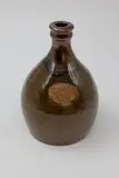 Barry Brickell, 'SYC Thames Wines' bottle, stoneware with tenmoku and ash glazes, impressed brand mark to shoulders